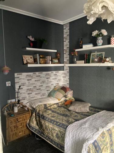 Ένα ή περισσότερα κρεβάτια σε δωμάτιο στο Casa Effata