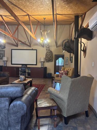 Χώρος καθιστικού στο Mahlangeni Lodge