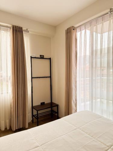 Una cama o camas en una habitación de Yourwasi