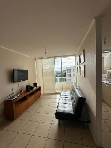 TV a/nebo společenská místnost v ubytování departamentos tres habitaciones