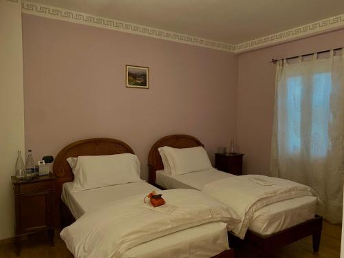Postel nebo postele na pokoji v ubytování Hacienda De Leon