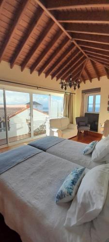 Ένα ή περισσότερα κρεβάτια σε δωμάτιο στο Matriz Guest House