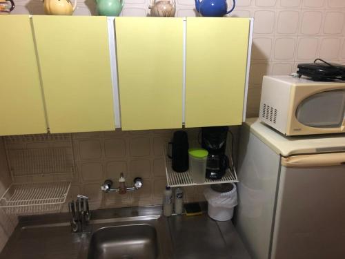 Küche/Küchenzeile in der Unterkunft Condomínio Quisisana