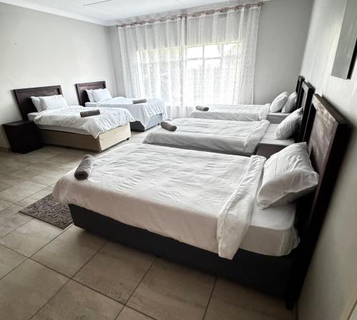 Cama o camas de una habitación en Hendrinas Guesthouse