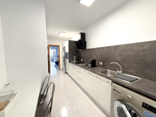 Η κουζίνα ή μικρή κουζίνα στο apartamento sabare rambla
