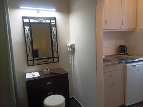 Koupelna v ubytování Olive house