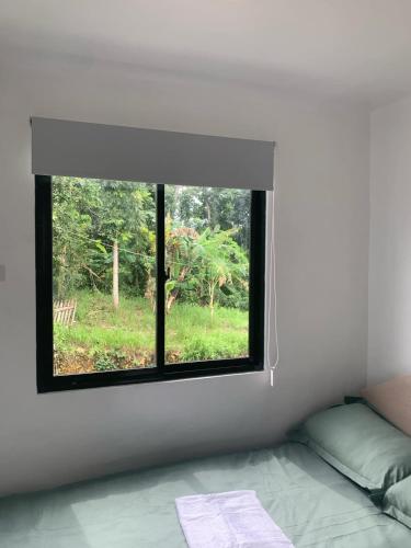 Ένα ή περισσότερα κρεβάτια σε δωμάτιο στο HUN'S Cozynest
