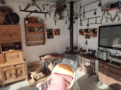 a room filled with lots of furniture and a tv at Exclusivo Chalet a Pie de Costa in Alcanar