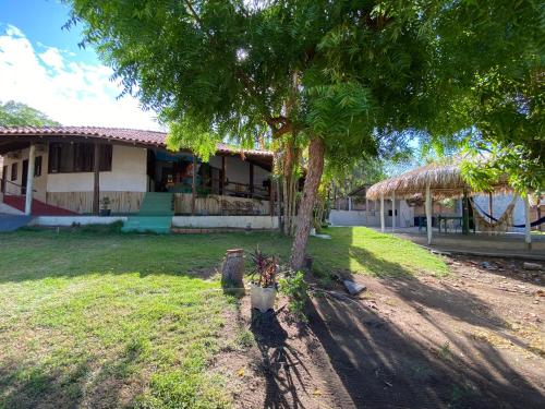 Un jardín fuera de Muretá Pousada
