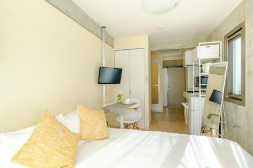 Kuchyň nebo kuchyňský kout v ubytování DeLIGHT HOTEL