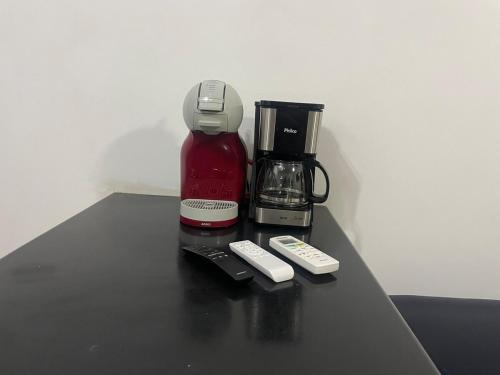 Příslušenství pro přípravu čaje a kávy v ubytování Casa 150m da Praia Martim de Sá