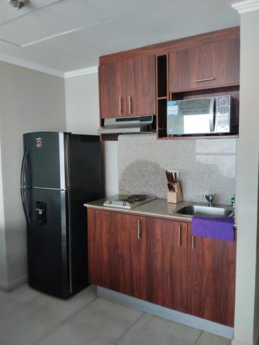 Dapur atau dapur kecil di luxuri suite vista al rio