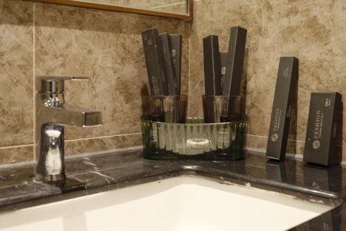 a bathroom counter with a sink and a faucet at 慕海Mosea悠享海景三卧房4806 in Johor Bahru