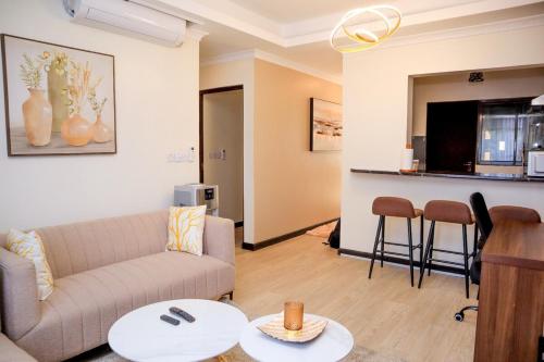 Posezení v ubytování Elegant 3 Bedroom Apartment - 1255 Palm Ridge