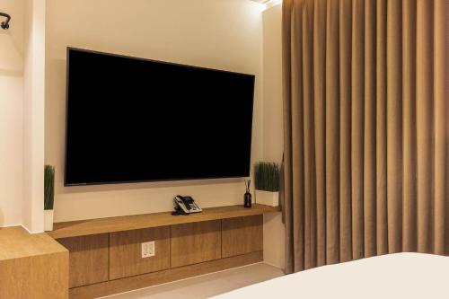 TV a/nebo společenská místnost v ubytování 양주 무인텔 호텔그리다 Hotel Grida