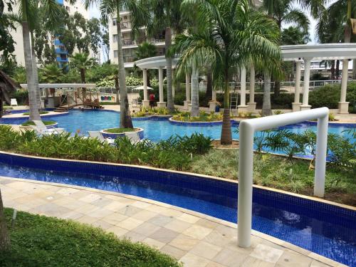 The swimming pool at or near Ap. Resort Recreio dos Bandeirantes