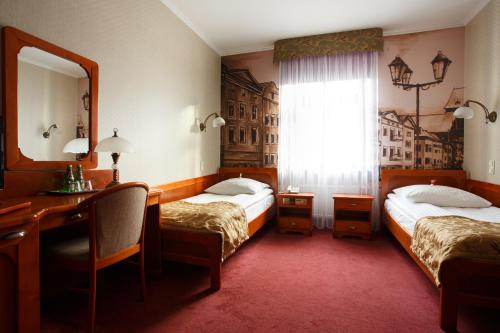 Una cama o camas en una habitación de Gotyk