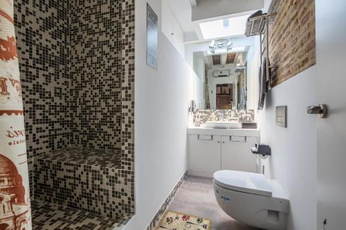 A bathroom at SevillaHome- Ave Cesar