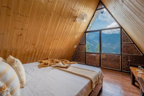 Postel nebo postele na pokoji v ubytování A-Frame Retreat By Bastiat Stays