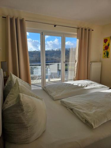 Postel nebo postele na pokoji v ubytování Hotel Sonne Garni