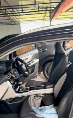 a close up of the dashboard of a car at Car Rental Sewa Mobil Batam in Pulau Sembakau Kecil