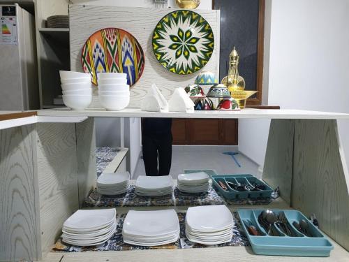 Η κουζίνα ή μικρή κουζίνα στο ZIYNAT Hotel