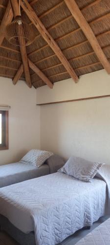 Postel nebo postele na pokoji v ubytování Casa de campo, La Resolana