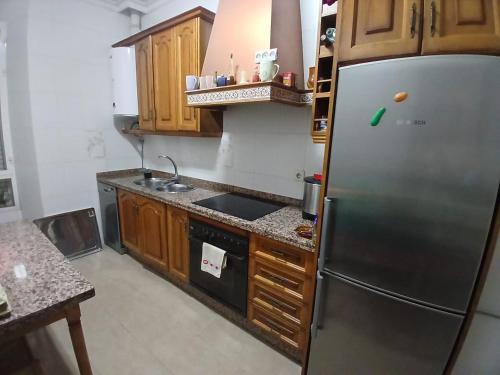 Kuchyň nebo kuchyňský kout v ubytování Alojamiento en Residencial Capuchinos cerca del centro histórico de Málaga
