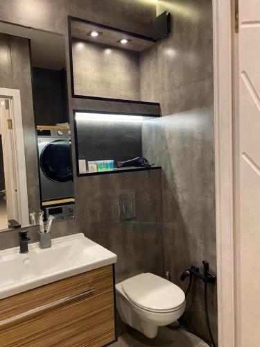 Koupelna v ubytování солнечная квартира в центре города