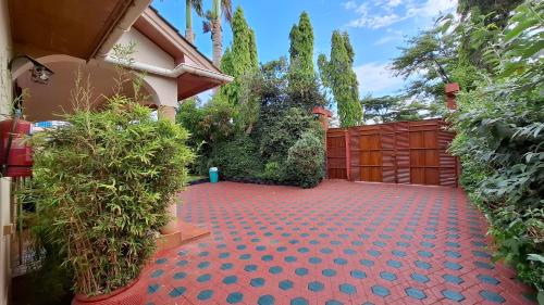 Κήπος έξω από το Korona House Hotel