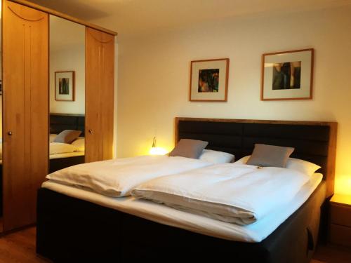 En eller flere senge i et værelse på Apartment Flasch