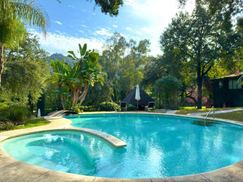 Foto La Fuente del Pedregal Casa 1 - Lago y piscinas 4