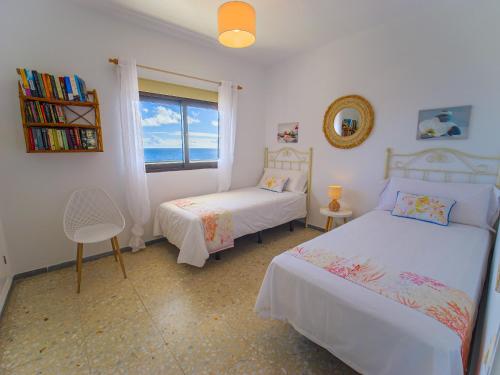 Ένα ή περισσότερα κρεβάτια σε δωμάτιο στο Villa GUACIMARA