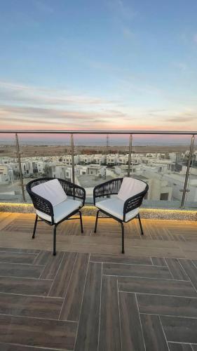 two chairs sitting on top of a roof at Sky Star Hotel free shuttle to Hurghada City center in Hurghada