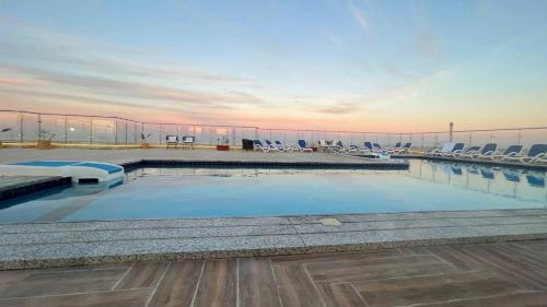 a large swimming pool on top of a building at Sky Star Hotel free shuttle to Hurghada City center in Hurghada