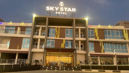 a building with a sky star hotel sign on it at Sky Star Hotel free shuttle to Hurghada City center in Hurghada