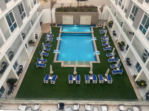 an overhead view of a swimming pool in a hotel at Sky Star Hotel free shuttle to Hurghada City center in Hurghada