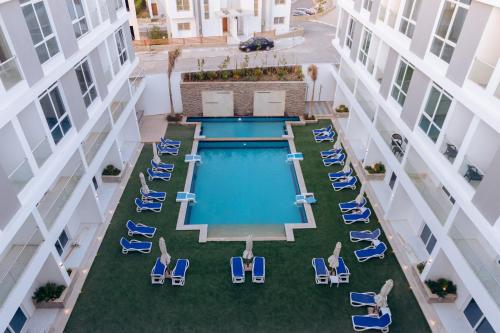 an overhead view of a swimming pool in a building at Sky Star Hotel free shuttle to Hurghada City center in Hurghada