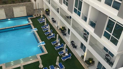 an overhead view of a swimming pool in a building at Sky Star Hotel free shuttle to Hurghada City center in Hurghada