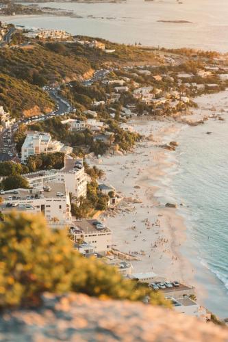 an aerial view of a beach with people on it at Arc Guest House in Cape Town