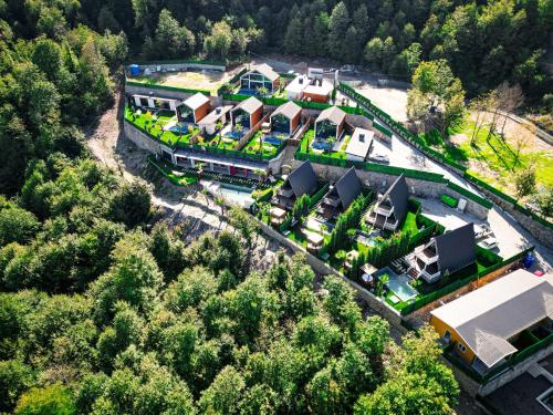 an aerial view of a house with a train at Grand Paradise Resort Sapanca in Sapanca