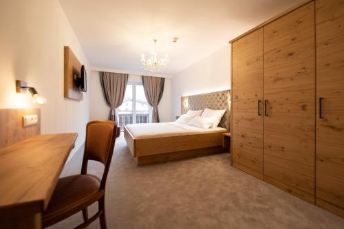 Postel nebo postele na pokoji v ubytování Thurners Boutique Hotel