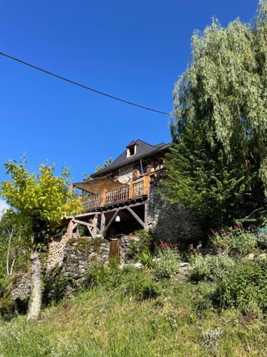 a house sitting on top of a hill at les chalets de Maryline in Accous