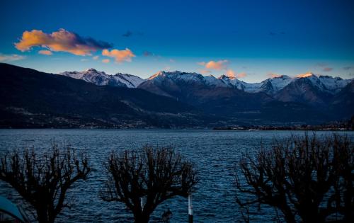 a view of a lake with mountains in the background at Fall In Love with Como Lake in Bellano