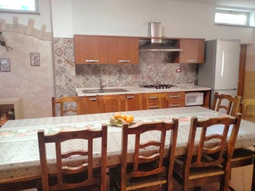 Kuchyň nebo kuchyňský kout v ubytování Casa Flasia