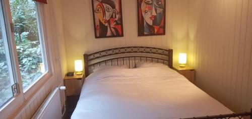 Postel nebo postele na pokoji v ubytování chalet bosrust nr 38