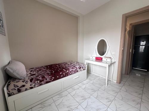 Postel nebo postele na pokoji v ubytování Blue Horizon Apartment