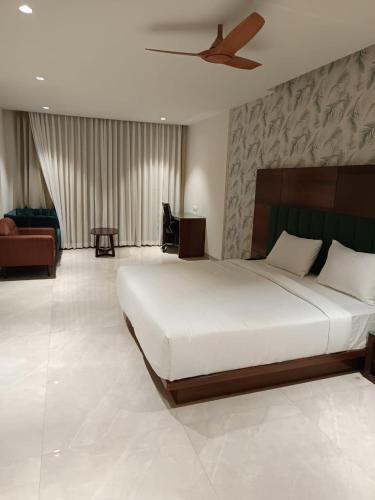 Postel nebo postele na pokoji v ubytování Hotel Atiraj