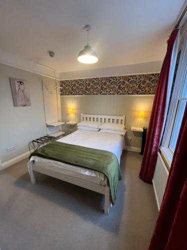 Katil atau katil-katil dalam bilik di The Palmerston Rooms