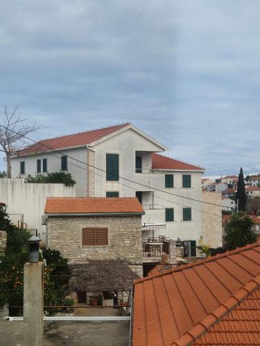 a group of buildings with red roofs at Solentia in Stomorska